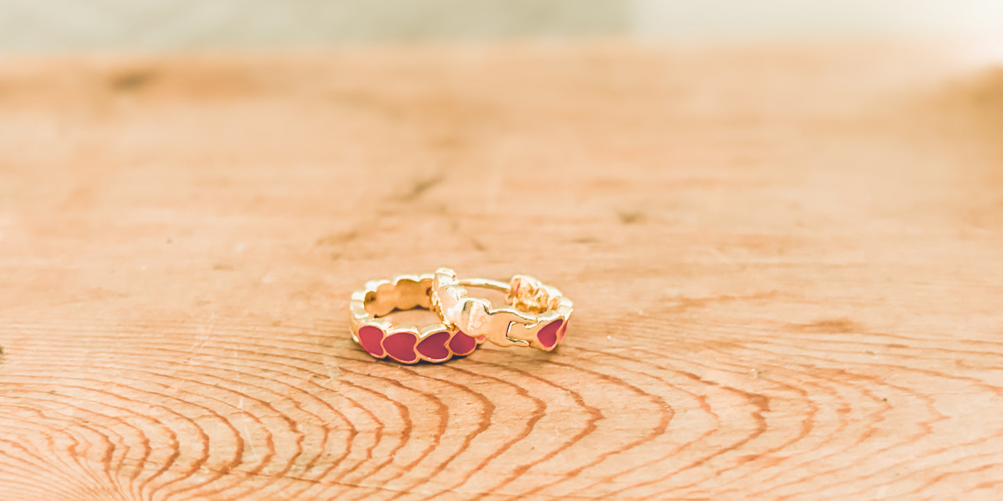 Adorable Gold and Red Heart Huggies