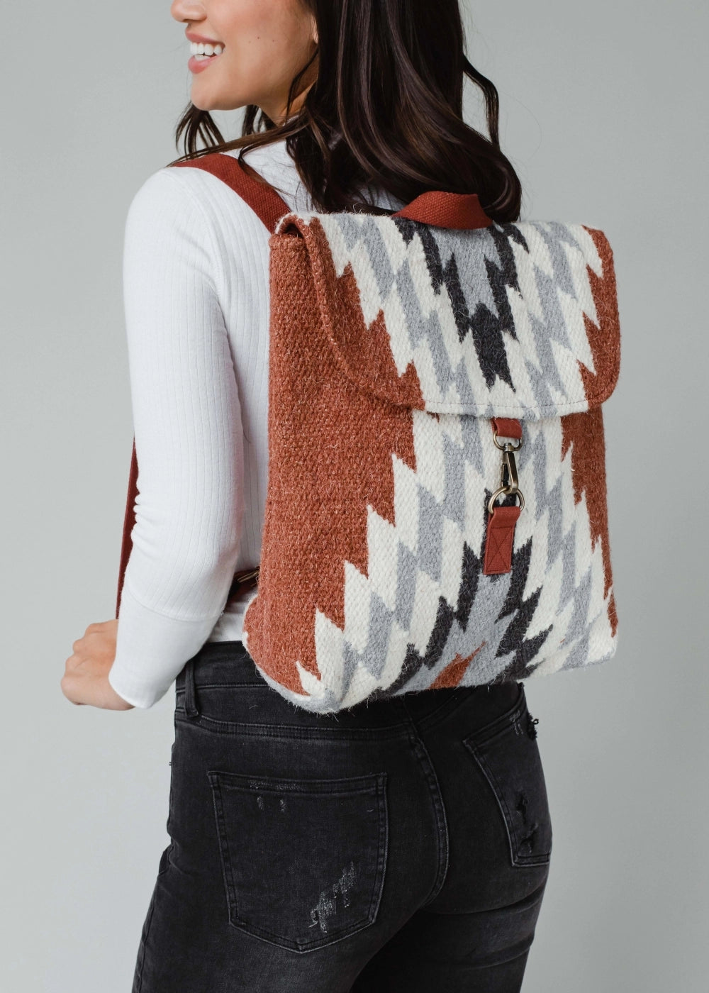 aztec leather backpack Wrangler Print and dual side pockets for bottle or other travel gear Rust, Cream & Gray Aztec