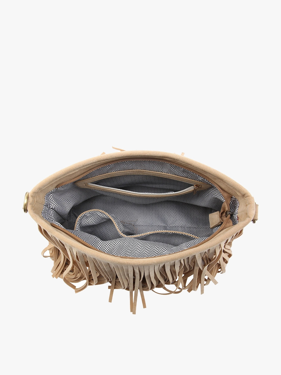 Beige suede fringed handbag on a white background, open and viewed from above, showing abundant fringe, a black and white chevron print interior lining, and various pockets including a zip closure