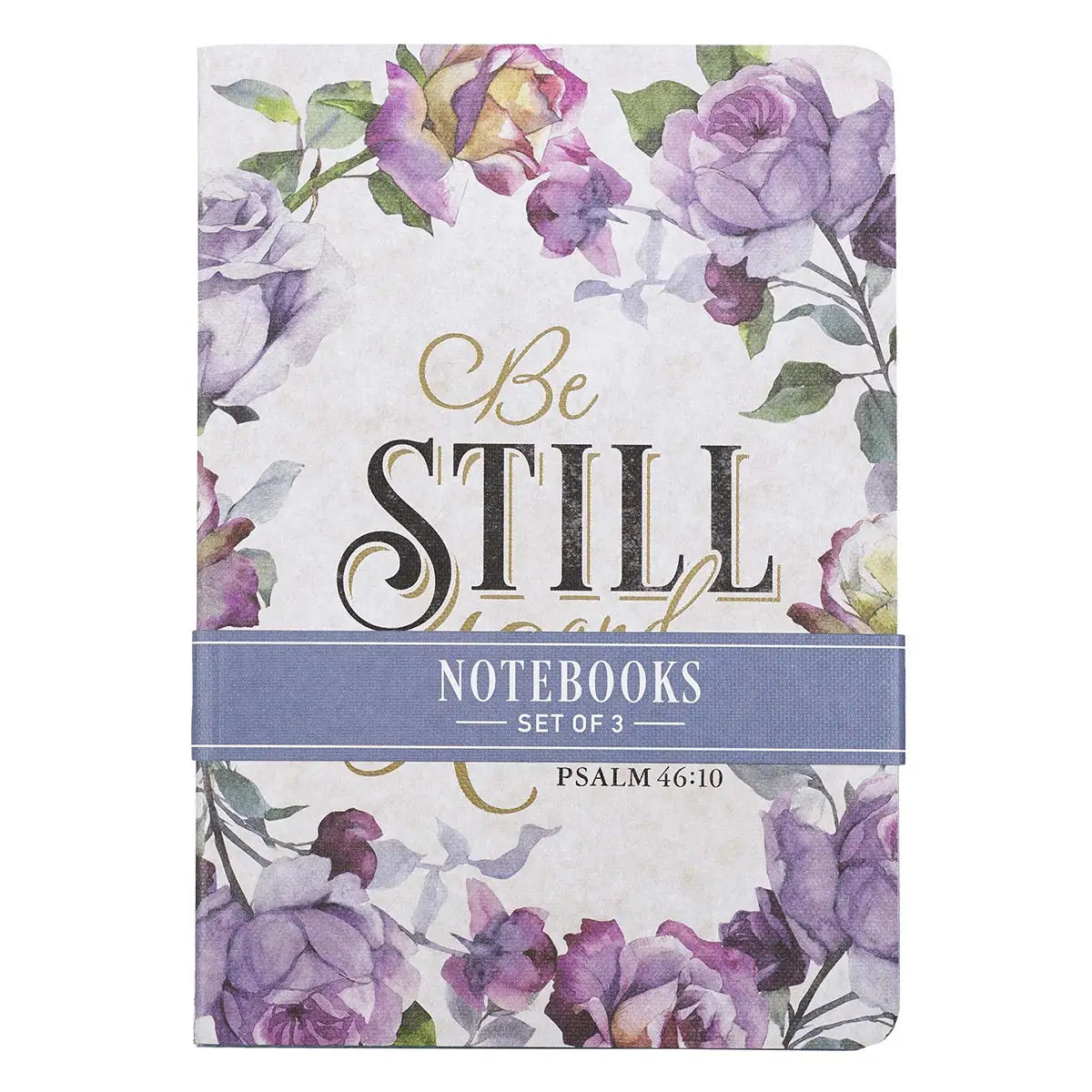 Decorative stationery item, three notebooks with 'Be Still' in gold script surrounded by watercolor purple and pink roses, bound by a blue belly band reading 'Notebooks Set of 3 Psalm 46:10'